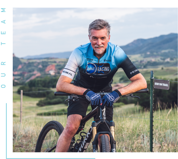 Littleton, CO Orthodontist Dr. Wade Housewright riding a bicycle