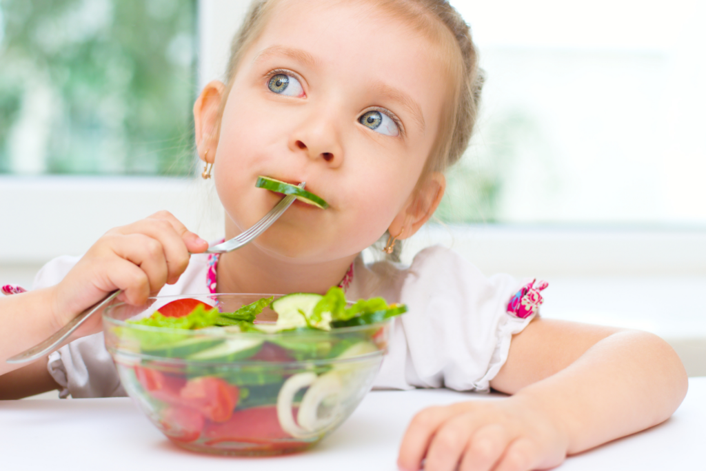 girl eating a healthy snack in Highlands Ranch CO